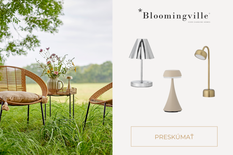 Svietiaca bezdrôtová prenosná LED lampička Bloomingville na večernom stole vytvárajúca útulnú hygge atmosféru.